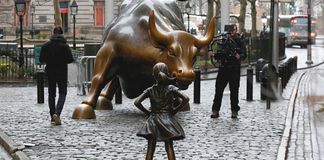 statue charging bull