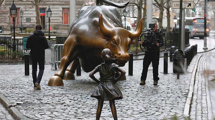 statue charging bull